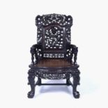 Hardwood carved throne chair Chinese, late 19th Century with ornate dragon back and dragon and cloud
