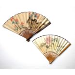 Two painted fans Chinese, Republic period the first painted with floral blooms, signed to the left-