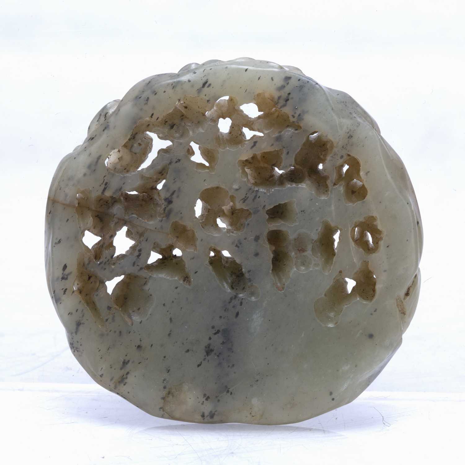 Pale green jade roundel Chinese with carved with a doe holding a ling chi fungus in its mouth, set - Image 2 of 2