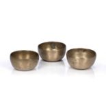 Three Tadobati singing bowls Tibetan, 16th/17th Century fundamental tones ranging from 4th octave F#