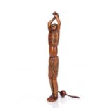 Wood netsuke of Ashinaga Japanese the standing figure with his arms outstretched, the top half