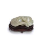 Mutton fat jade pebble Chinese, 19th Century carved as a recumbent water buffalo with herdsman