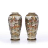 Pair of Satsuma vases Japanese Meiji period each with mirrored landscape decoration, signed