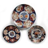 Two Arita dishes Japanese, circa 1800 each with Imari type decoration with flowers with cobalt