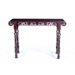 Carved hardwood altar table Chinese, circa 1900 with vine carved frieze on bamboo style supports,