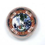 Shallow rimmed bowl Chinese, 18th Century decorated with a central medallion bearing a twelve