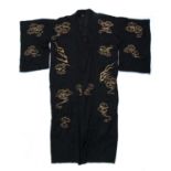 Chinese black ground robe Chinese decorated with gold coloured thread dragons and clouds.Condition