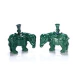 Pair of green glazed elephant candle holders Chinese, 18th/19th Century each with their head