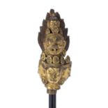 Headpiece of a sceptre or large vajra Tibetan, 15th/16th Century gilt bronze and iron, depicting a