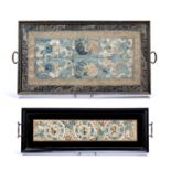 Two framed embroideries Chinese the first depicting butterflies and fruiting branches, with an outer