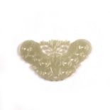 White jade plaque Chinese, late 18th Century carved as an open winged butterfly hovering by a