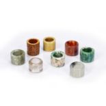 Group of eight archer's rings Chinese including bone, jade and rock crystal examples (8)Condition
