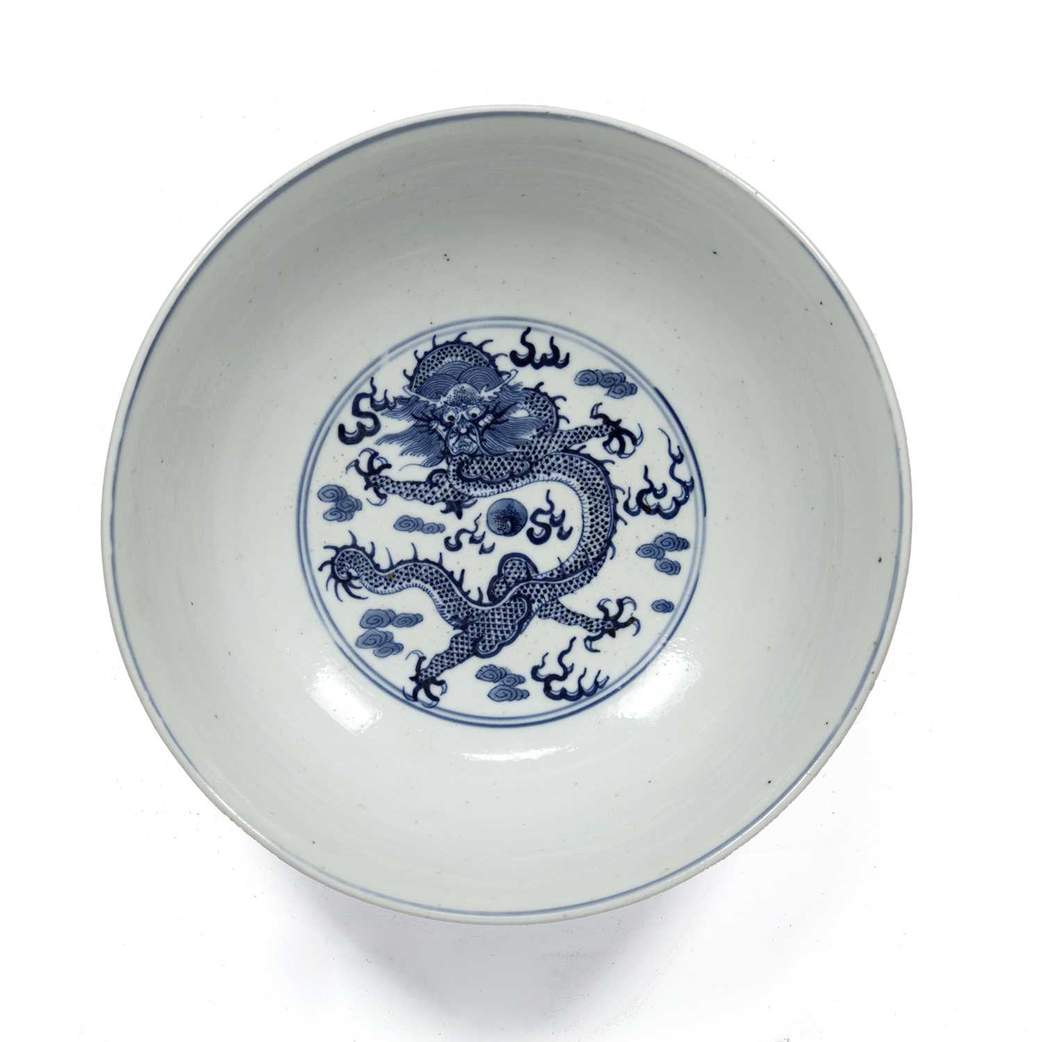 Blue and white bowl Chinese, 19th Century decorated to the exterior with dragons in flight above