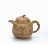 Yixing teapot Chinese, 20th Century with incised landscape scene, and seal marks to the inside of