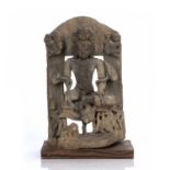 Stone stele North/Central India, possibly 11th/12th Century depicting a multi-headed deity and