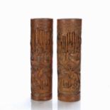 Pair of bamboo brush pots Chinese, 19th Century each carved with figures and pavilions in forests of