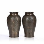 Pair of bronzes vases Japanese, Meiji period engraved with a three-clawed dragon in flight to the