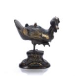 Parcel gilt-bronze duck-shaped incense burner and cover Chinese, 18th Century cast standing on its