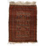 Beluch prayer rug Afghanistan with central panel of traditional motifs within a multiple border,