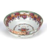 Famille rose bowl Chinese, 18th Century painted with a central vase of flowers, 28.5cm