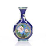 Cloisonne enamel moon flask Chinese, 19th Century decorated with a surround of magnolia blossoms