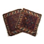 Near pair of prayer mats/rugs Caucasian decorated with geometric designs to the centre and sides,