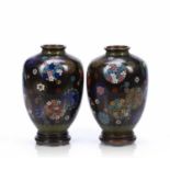 Pair of cloisonne vases on hardwood stands Japanese, late 19th Century with coloured decorative