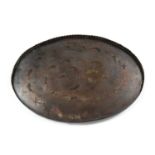 Mughal metal oval tray Northern India, 18th/19th Century with a circle of fish in brass inlaid