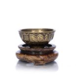 Miniature gilt bronze bowl Sino-Tibetan, 18th/19th Century decorated to the exterior with lotus