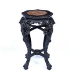 Marble topped urn stand Chinese with carved legs and under tier, top inset with mottled marble, 61.