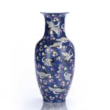 Crane decorated vase Chinese, early 20th Century painted with white enamel cranes on a blue