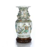 Famille verte vase Chinese, mid 19th Century painted with a scholar at a table before a seated lady,