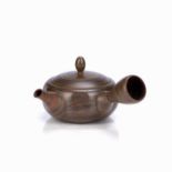 Yixing side handled teapot Chinese, 20th Century with swirled designs, impressed mark beneath the