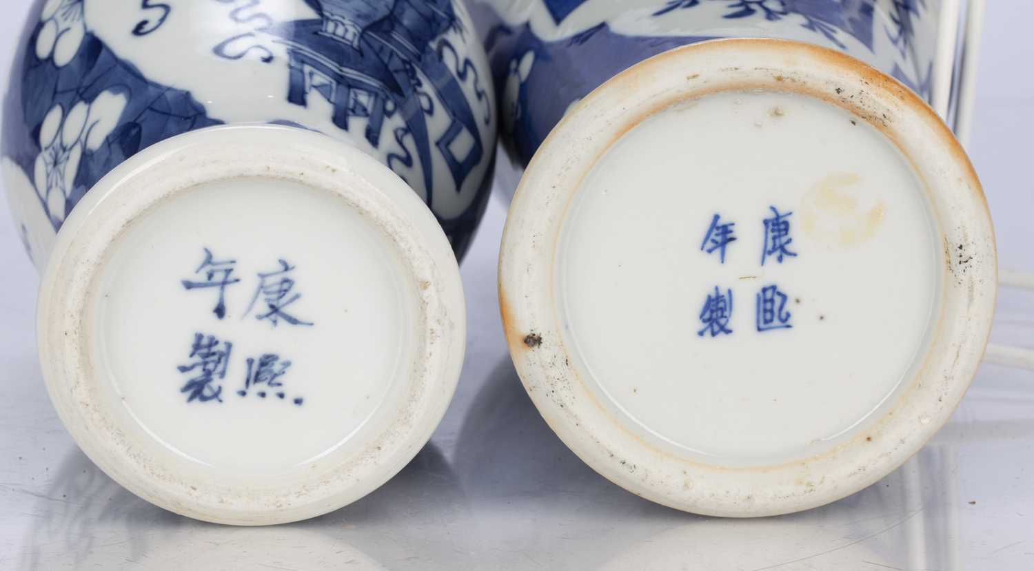 Two blue and white prunus vases Chinese, 19th Century one lidded, both decorated with antiques and - Image 3 of 3