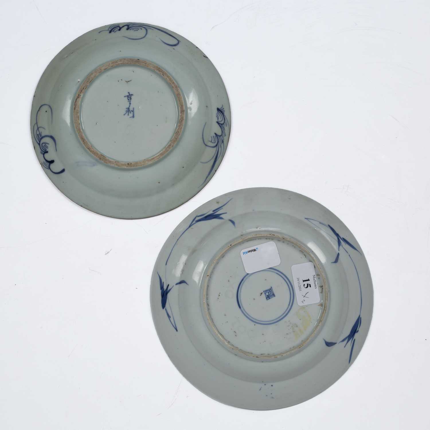 Two blue and white dishes Chinese, Kangxi period one painted with a basket of flowers, 21cm, and the - Image 2 of 2