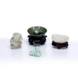 Group of hardstone carvings Chinese comprising of a spinach green jade bowl with a fitted stand, 6cm