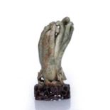 Mottled jade finger citron Chinese carved with long fingers and on a leafy stem, with a fitted