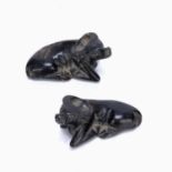 A pair of hardstone water buffalo Chinese depicted lying down with their heads raised, 5.5cm