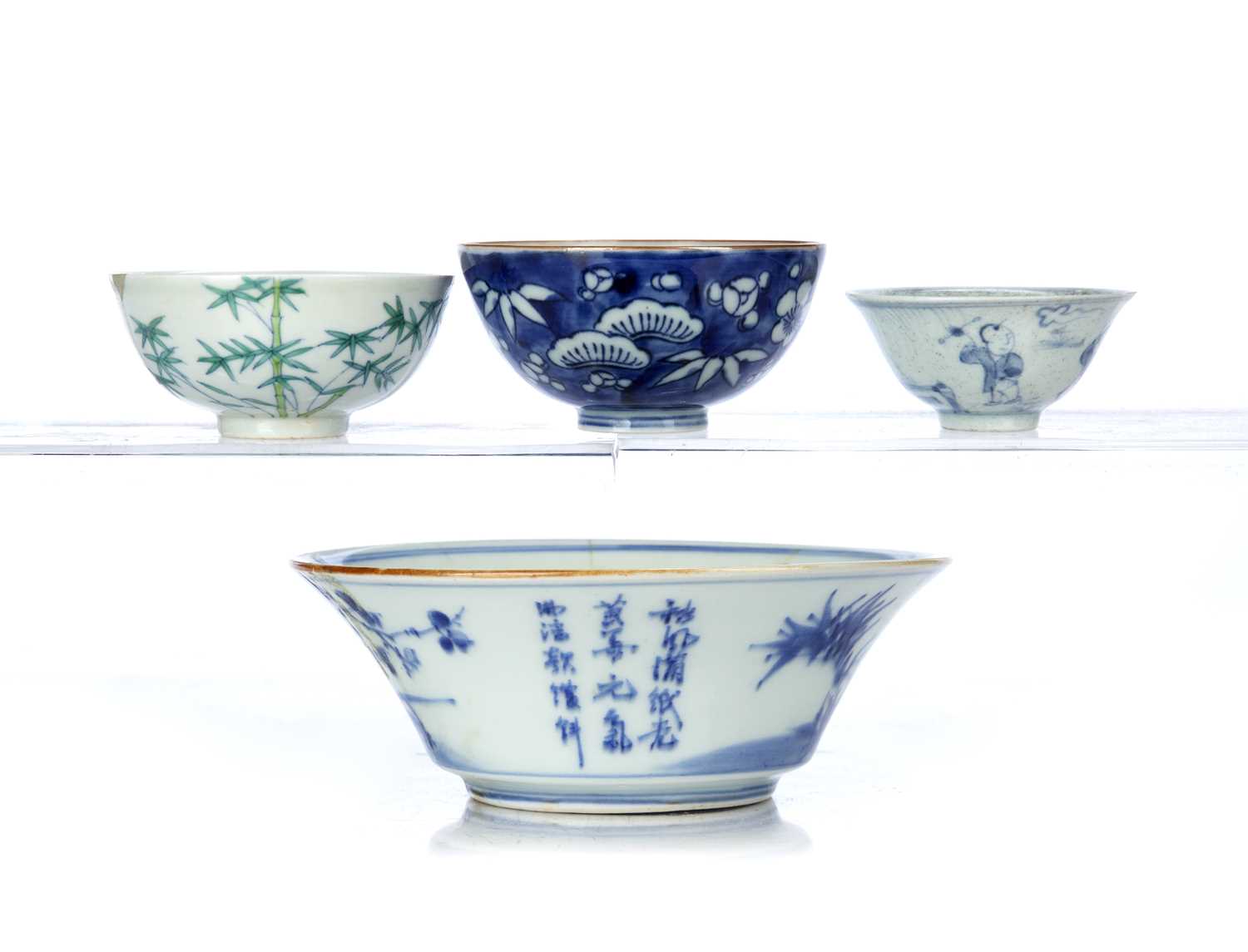 Group of four bowls Chinese to include a foliate decorated bowl with three lines of inscription, - Image 4 of 5