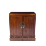 Elm side cupboard Chinese with carved frieze to the base and with brass lock, 90cm wide x 55cm