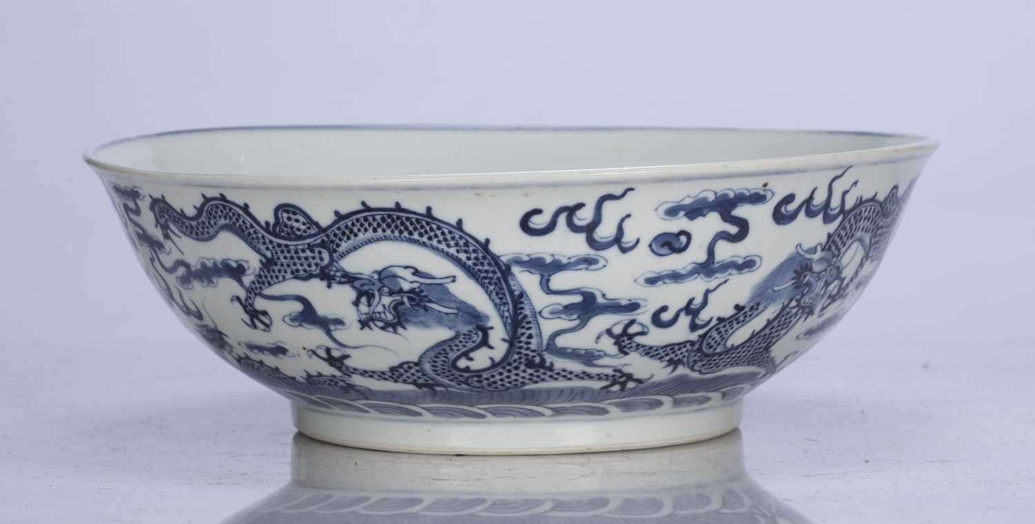 Blue and white bowl Chinese, 19th Century decorated to the exterior with dragons in flight above - Image 3 of 4