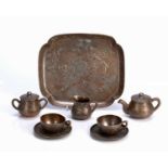 Eight piece child's copper tea set Japanese, late 19th Century each piece with a bird and