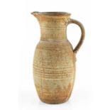 Michael Casson (1925-2003) Large jug oatmeal glaze impressed potter's seals 34cm high. Provenance: