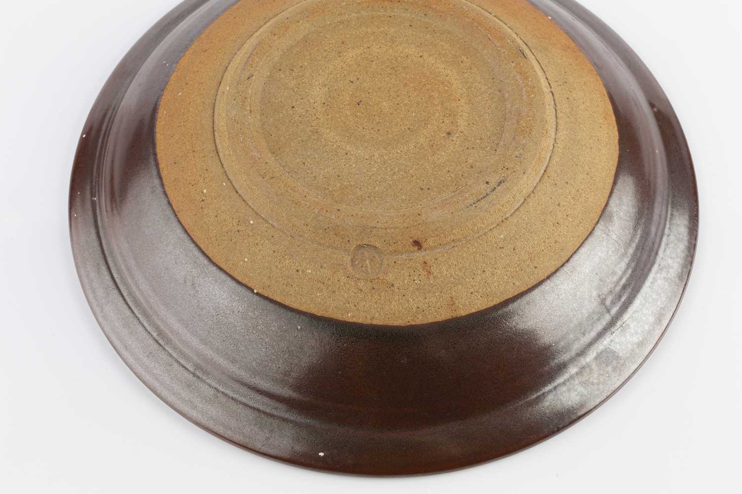 Ray Finch (1914-2012) at Winchcombe Pottery Dish iron glaze with brushwork ripple effect impressed - Image 2 of 2
