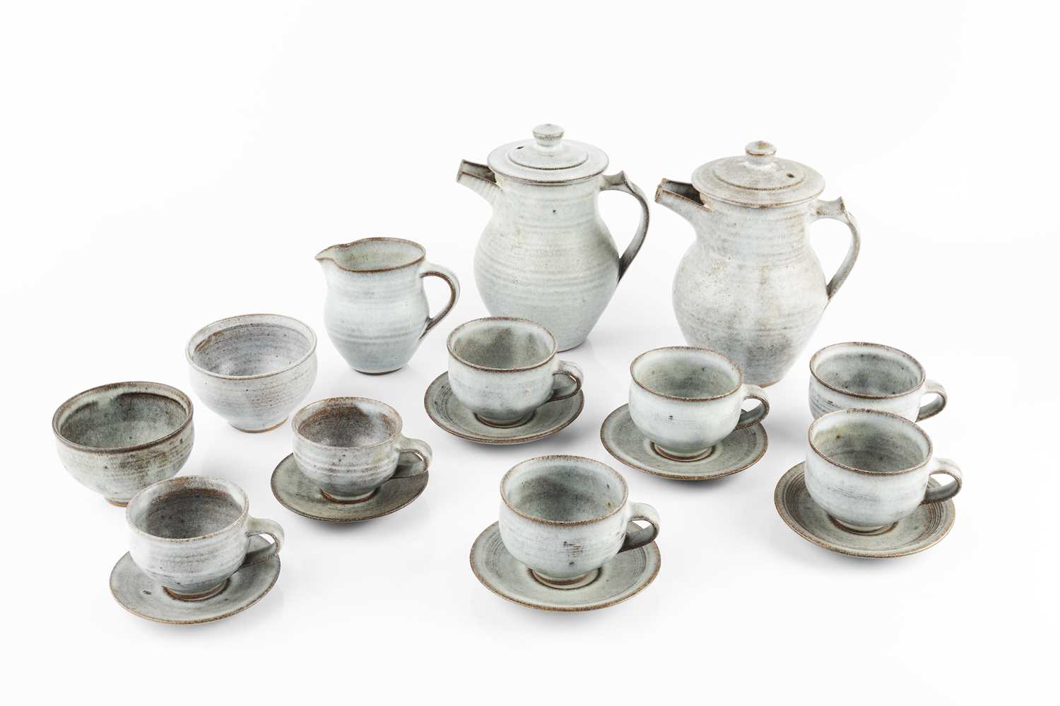 Gwyn Hanssen Pigott (1935-2013) Coffee set comprising two coffee pots, seven cups and saucers, two