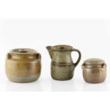 Ray Finch (1914-2012) Two storage jars and cover salt glazed impressed potter's seals 13cm high; and