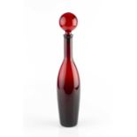 Paolo Venini (1895-1959) Bottle and stopper, circa 1950 deep ruby red coloured glass 43cm high.