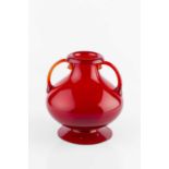 Vittorio Zecchin (1878-1947) Murano glass vase, circa 1920 in red with loop handles 19cm high.