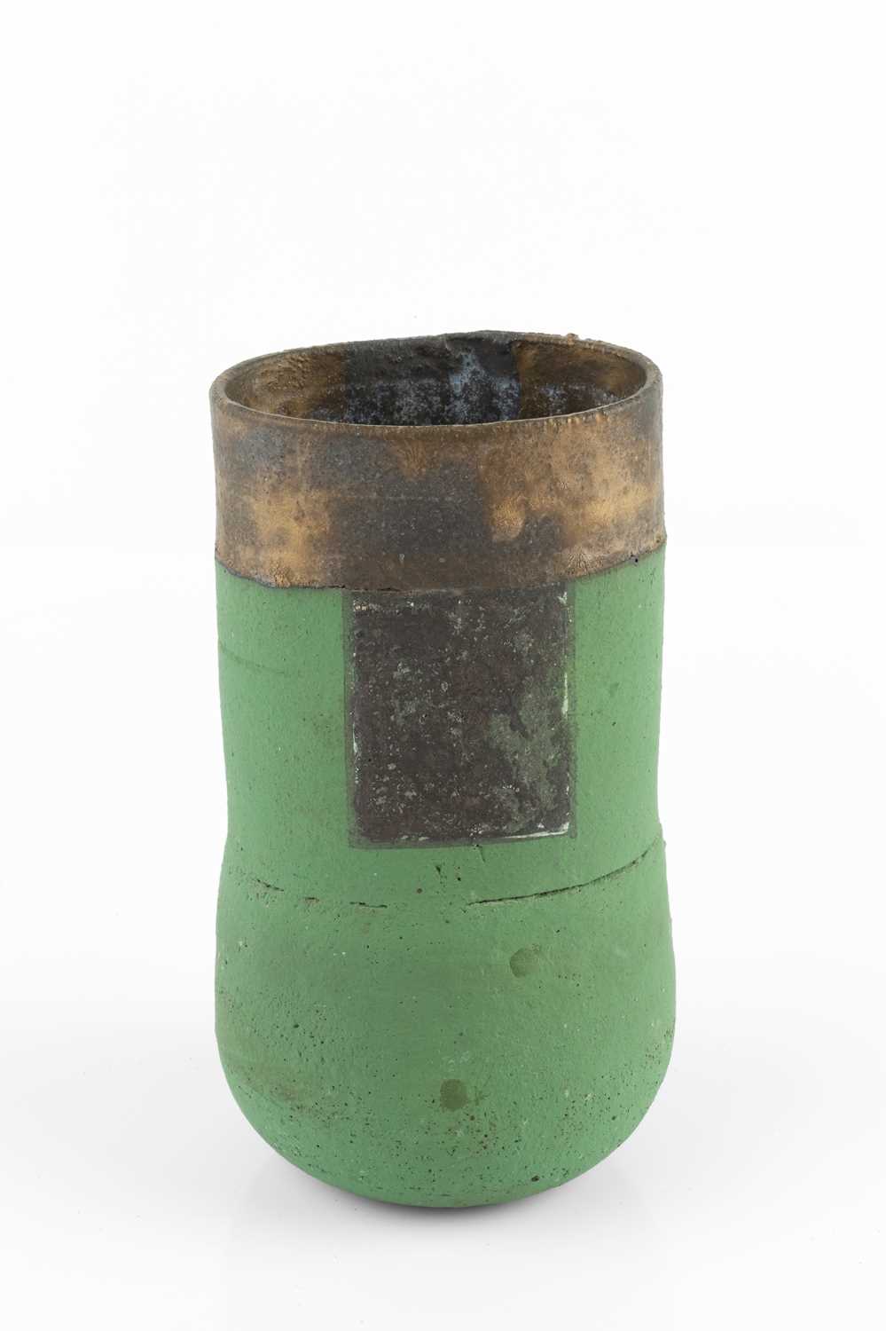 Robin Welch (1936-2019) Vessel stoneware, squeezed form with a green glaze beneath manganese band