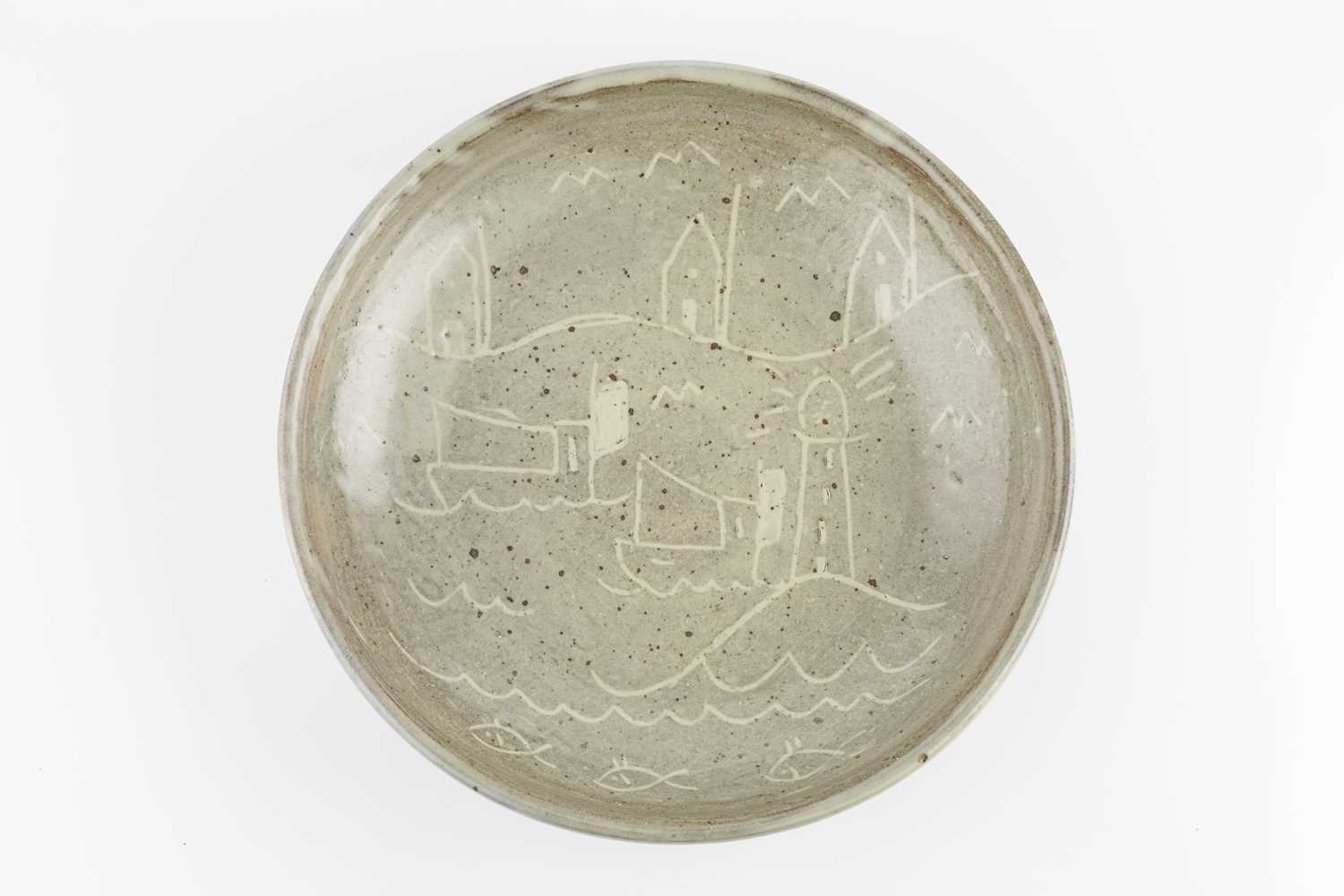Trevor Corser (1938-2015) at Leach Pottery Charger incised with a harbour, lighthouse and boats,